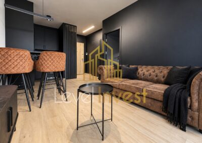 Apartament przy ul. Filarskiego 3 w Gdańsku — salon, zdjęcie wyróżniające